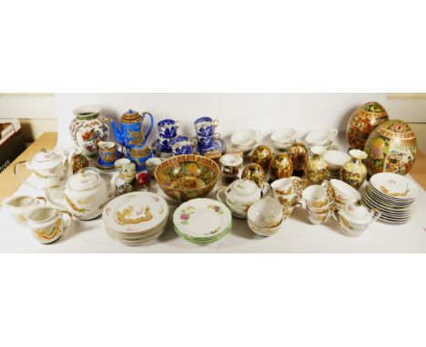 A collection of oriental ceramics, to include Chinese and Japanese coffee/tea services, vases, bowls, trinket boxes, together