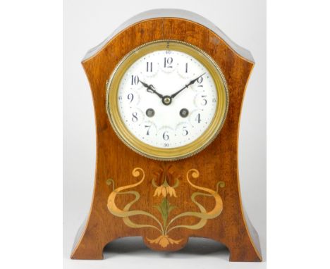 An early 20th century striking mantel clock, inlaid mahogany case with enamelled dial, 8 day movement striking on gong.27cm t