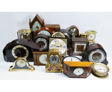 A large collection of clocks, to include Smiths Westminster chime, anniversary, carriage, and others, with manual &amp; quart