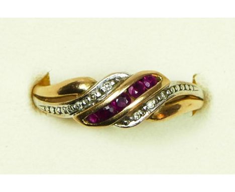 A 375 stamped gold, ruby and diamond dress ring, stated weight 0.02ct, O 1/2, 1.9gm 