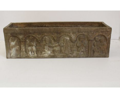 A stoneware planter trough, cast with Norse figures at a wedding ceremony within arches, 73.5 x 21cm external dimensions 