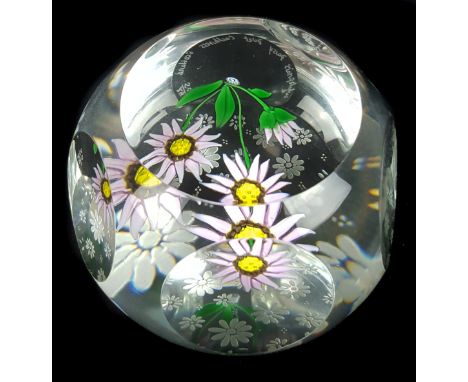 A Caithness glass paperweight, Whitefriars Daisy Duet, designed by Allan Scott, two daisy flowers and a bud over a Whitefriar