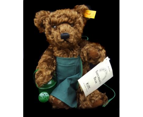 A Margarete Steiff Saturday's Bear form the Bears of the Week series, with apron and watering can, original paper label