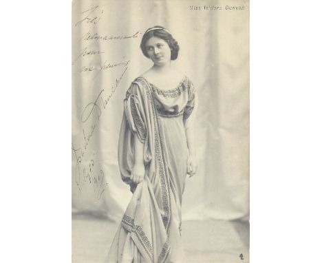 DUNCAN ISADORA: (1877-1927) American Dancer. Rare vintage signed postcard photograph of the elegant Duncan standing in a full
