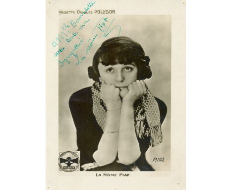  PIAF EDITH: (1915-1963) French Singer. Rare vintage signed and inscribed 5.2 x 7 photograph of a very young Piaf, seated, in
