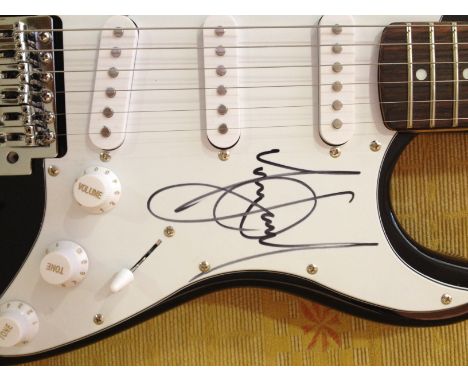 JACKSON MICHAEL: (1958-2009) American Pop Singer. A black Rocktile Electric Guitar signed by Jackson in bold black ink with h