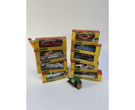 A selection of 9 boxed Corgi Whizzwheels die cast cars and a miniature static engine