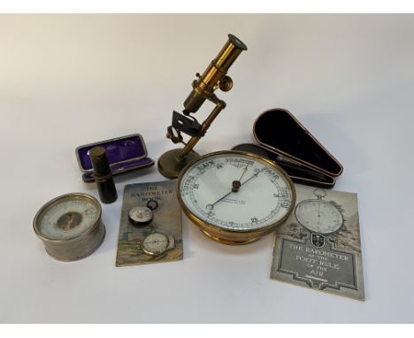 A 19th/20th century scholar's microscope, measuring H 26cm, together with a marine barometer by R. McQueen and Son and other 