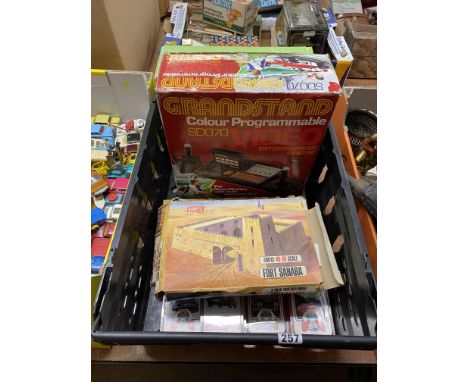 Box of assorted vintage toys and games, including boxed Airfix buildings and Grandstand video games