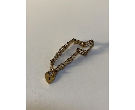 A 9ct gold gate link bracelet, with 9ct padlock pendant, weight 7.1g