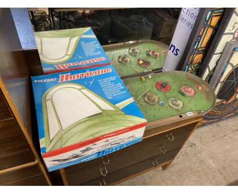 A boxed Keil Kraft Hurricane control line model and a bagatelle board