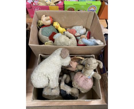 Two boxes of vintage soft toys, including a Steiff Mecki hedgehog, a Chiltern bunny with internal rattle and later soft toys