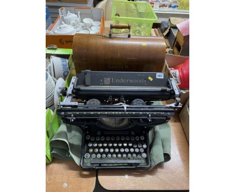 Singer sewing machine and an Underwood typewriter