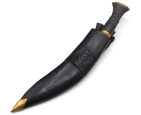 Modern Military kukri with black leather scabbard together with karda and chakmak knifes tools. kukri with turned ebonised wo