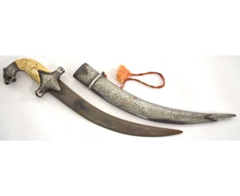 Moghul / Indo persian Damascus tiger head dagger. Curved double edged Damascus steel blade with Islamic cartouche at center. 