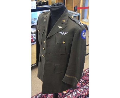 Second World War American USAAF Captains Service Dress jacket with 8th Airforce bullion patch, and sterling silver Airforce w