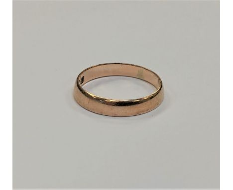 A 9ct gold band ring, size K, 1.5g.