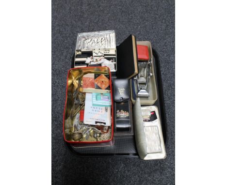 A tray of brass ornaments, torch tool kit, cased dominoes, hair clippers, cased Colibri cigarette case and lighter 