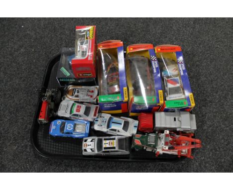 A tray of 20th century die cast vehicles, Matchbox, Racing cars and trucks together with a boxed Burago Lamborghini and three