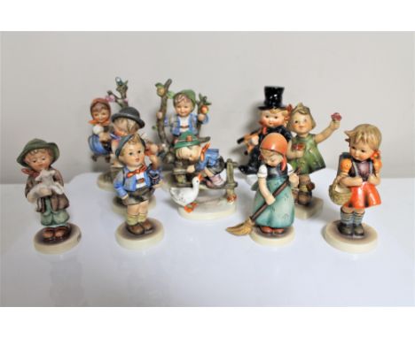 Nine Hummel figures together with a Goebel figure. (10) CONDITION REPORT: All nine figures appear to be in good condition wit