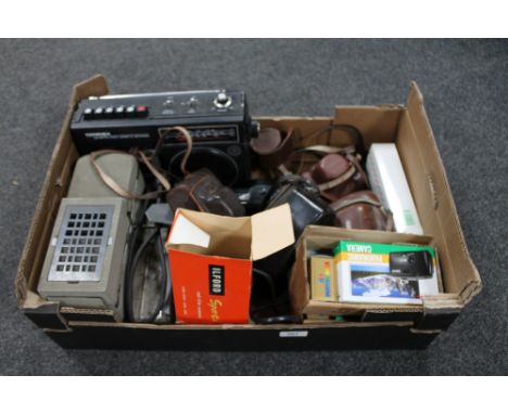 A box of vintage and later cameras, Haminex radio cassette recorder, projector