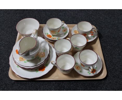 A tray of twenty-two piece hand painted china tea service 