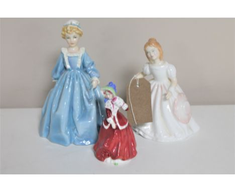 A Royal Worcester figure - Grandmother's Dress and two further Royal Doulton figures - Amanda HN 2996, Christmas Morning HN 3