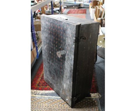 An early 20th century tin travelling trunk 
