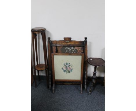 An early 20th century oak framed tapestry fire screen, rustic fire screen, plant stand and a wine table 