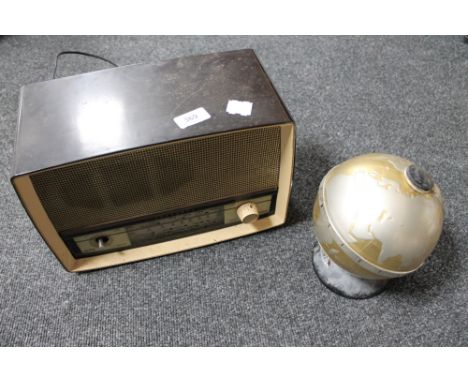 A Ferranti Bakelite cased valve radio together with a vintage fleetwood transistor in the form of a globe 