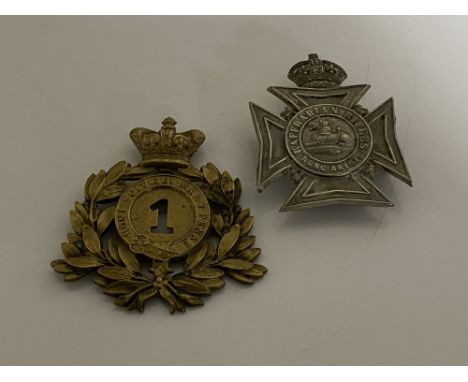 Two Edwardian helmet plates, 1st foot and Kaffrarian rifles