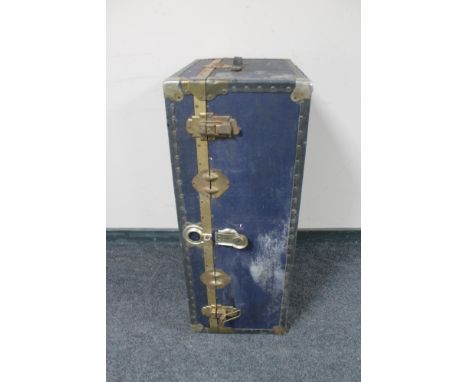 An early 20th century metal bound travelling trunk 