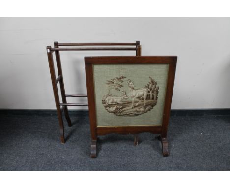 A Victorian inlaid mahogany towel rail together with a mahogany fire screen depicting two goats 