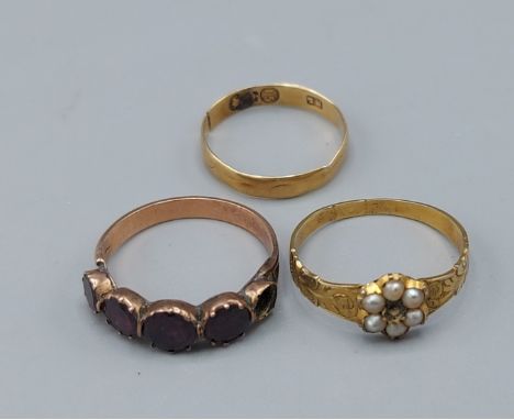 A 19th Century Pearl set dress ring together with an Amethyst set dress ring and a 15ct gold wedding band, 3.8gms 