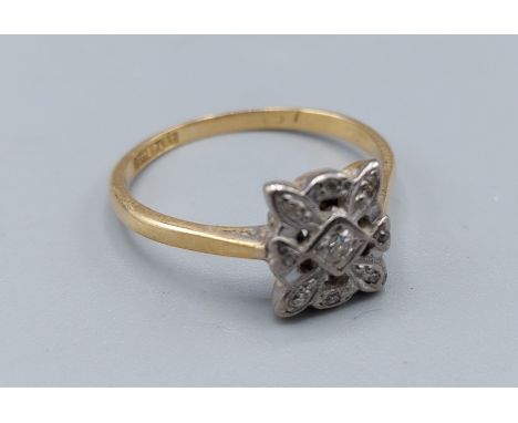An 18ct gold Diamond cluster ring of square form, 3.1gms, ring size Q 