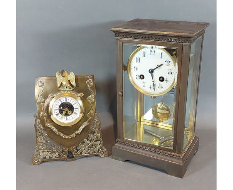 An Edwardian Library clock, the enamel dial with Arabic numerals and two train movement together with a brass strut clock 