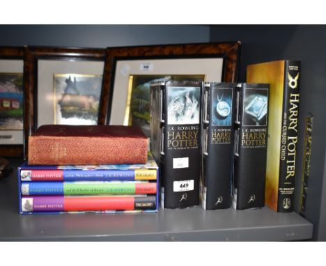 A selection of Harry Potter books including a Ted Smart boxed set of the first three volumes, three new cover editions of The