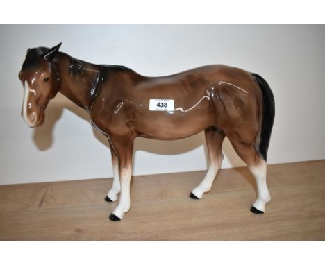 A large Melba Ware porcelain horse in brown gloss finish, measuring 30cm tall.