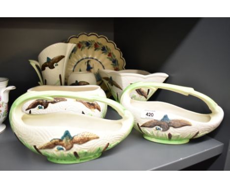 A collection of six  Flying Duck and Cattails Sylvac planters and jug sold along with a an HB Quimper scalloped edge faience 