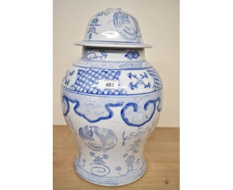 A Chinese style blue and white ginger jar with lid AF having previously been converted into a lamp so missing top knot.