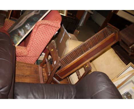 Two 19th Century mahogany rope twist dining chairs; and a CD rack