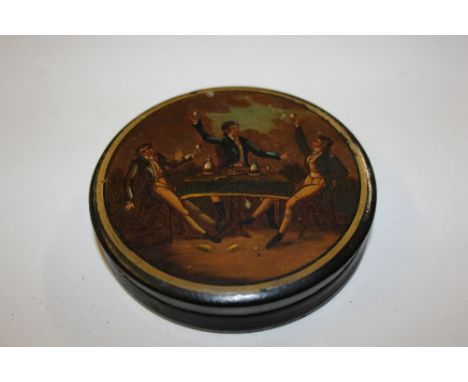 A 19th Century papier maché snuff box decorated with three gentleman drinking wine 