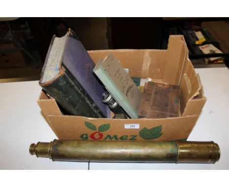 A box of militaria to include buttons, a pair of binoculars, a dirk knife, telescope, a Staff Duties in the Field manual date