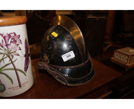 A vintage Swiss fireman's helmet 