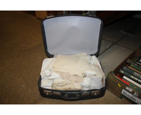 A case of vintage lace and linen