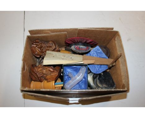 A box containing an oriental silk work embroidered fan; a table lighter; a pin cushion in the form of a ladies hat; and vario