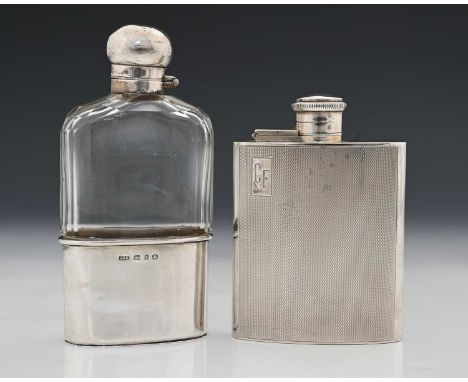 A George VI silver hip flask, of rectangular form, the exterior with engine-turned decoration, initialled 'CF', the cap secur