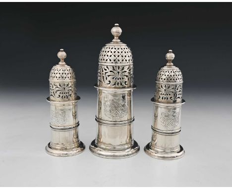 A suite of three Queen Anne Britannia Standard silver (0.958) lighthouse casters, comprising a single larger caster, flanked 