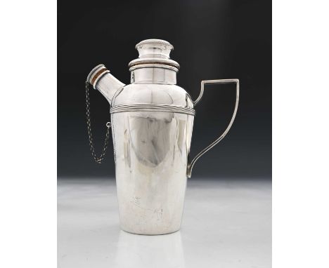 A twentieth-century electroplated cocktail shaker, with dual detachable covers, each with cork stoppers, the angular handle w