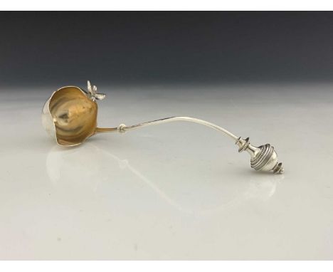 Tiffany & Co.An American silver Aesthetic style cream ladle, with bobbin-turned finial, the organic form bowl with trifurcate